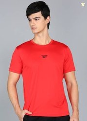 REEBOK Men Solid Crew Neck Polyester Red T-Shirt